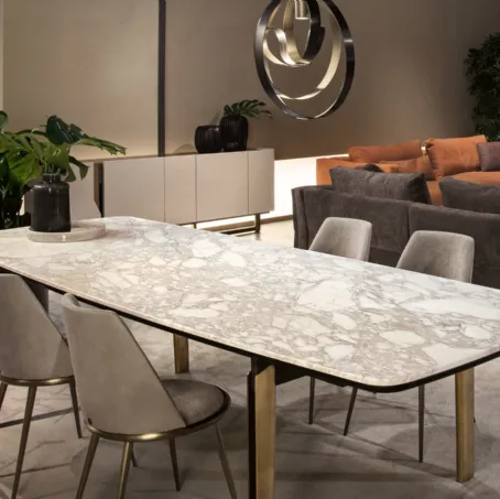 Tavolo in marmo con gambe in metallo scavato Mirage di Cantori